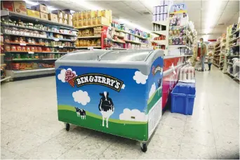  ?? (Ronen Zvulun/Reuters) ?? A FREEZER with the Ben & Jerry’s logo at a store in Efrat.