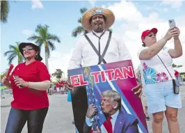  ?? AFP ?? Seguidores de Trump arriban a un mitin de campaña en Miami