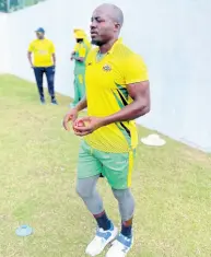  ?? PHOTO BY LENNOX ALDRED ?? Derval Green, who returns to the Jamaica Scorpions squad, gets ready to bowl during a net session at Sabina Park yesterday.