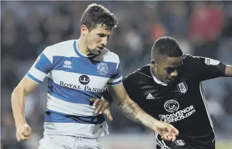  ??  ?? QPR’s Pawel Wszolek (left) battles it out with Fulham’s Ryan Sessegnon in their 2-1 derby defeat two weeks ago.