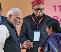  ?? PTI ?? Prime Minister Narendra Modi with senior party leader L K Advani and Sushma Swaraj on the second day of the two-day BJP National Convention, at Ramlila Ground in New Delhi on Saturday. —