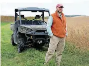  ?? [PHOTO BY EMILIE RICHARDSON, BLOOMBERG] ?? Minnesota farmer Pete Zimmerman is among farmers in three states now harvesting 16,000 acres of DNA-altered soybeans destined to be used in salad dressings, granola bars and fry oil, and sold to consumers early next year.