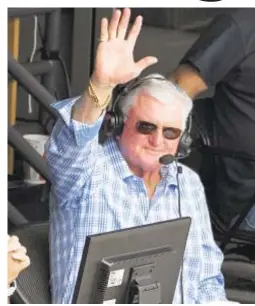  ?? GETTY ?? White Sox broadcaste­r Ken Harrelson, who’s retiring after season, waves to crowd after he’s honored on Hawk Day in Chicago.