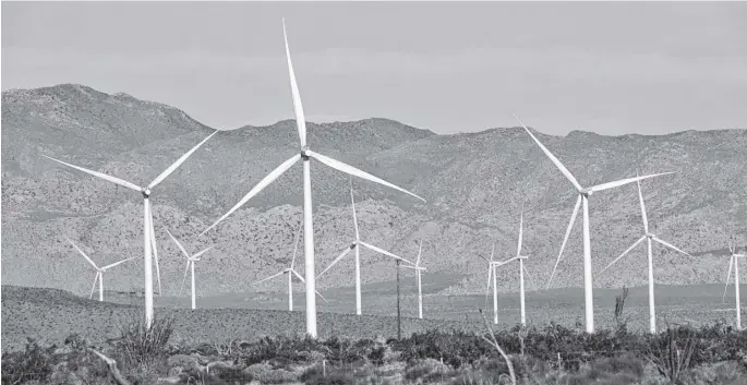  ?? BING GUAN ■ REUTERS ?? Power-generating Siemens wind turbines at the Ocotillo Wind Energy facility in California.