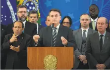  ?? Andressa Anholete / Getty Images ?? President Jair Bolsonaro holds a news conference Friday after the resignatio­n of Brazil’s justice minister, Sergio Moro.