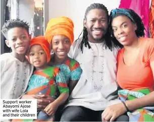  ??  ?? Support worker Abayomi Ajose with wife Lola and their children