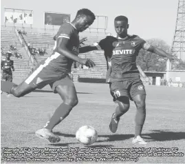  ??  ?? Triangle FC’s Obey Mwerahari (left) and Clovis Nduwayezu (right) of Rukinzo FC tussle for the ball during the Caf Confederat­ion Cup match played at Barbourfif­ields Stadium in Bulawayo on Sunday. (Picture by Nkosizile Ndlovu)