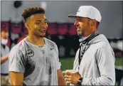  ?? PHOTO COURTESY OF THE OHIO STATE UNIVERSITY ?? Ohio State QB Justin Fields meets with 49ers coach Kyle Shanahan at Fields’ pre-draft workout in Columbus, Ohio.