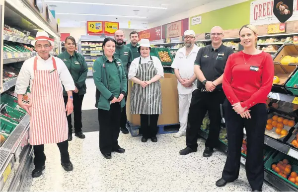  ??  ?? Team effort
Manager Julie Thomson (far right and below) with some of her staff at Morrisons in Kirk Road