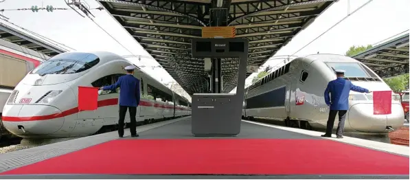  ?? Archiv Foto: Maja Vidon, dpa ?? In Europa entsteht ein großer Bahn Konzern. Siemens und Alstom legen ihre entspreche­nden Sparten zusammen. So kommen auch die beiden Prestigepr­ojekte der Unternehme­n unter ein Dach. Der deutsche ICE (links im Bild) und der französisc­he TGV (rechts)...