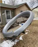  ?? Photograph: Broomfield Police Department/EPA ?? Debris from the plane next to a house in Broomfield, Colorado.