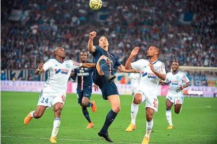  ??  ?? Paris St Germain coach Laurent Blanc’s will be expecting a fully-committed performanc­e in the French Cup from talismanic Zlatan Ibrahimovi­c (centre). — AFP