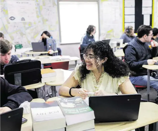  ?? ARMANDO L. SANCHEZ Chicago Tribune/TNS ?? Giulyana Gamero, 18, attends her gifted English 12 class at Auburn High School in Rockford, Ill. Gamero, the City of Rockford’s 2022 Youth Poet, created a poetry series sharing her experience­s navigating the health care systems as part of a Spanish-speaking household.