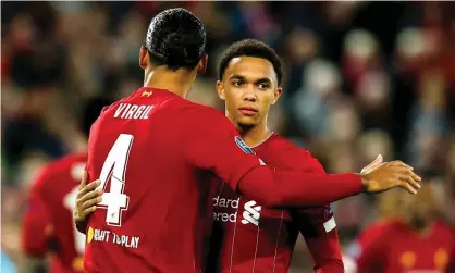  ??  ?? Trent Alexander-Arnold, pictured here with Virgil van Dijk, says Liverpool need to ‘use our heads a bit more’. Photograph: Robbie Stephenson/JMP/Rex/Shuttersto­ck