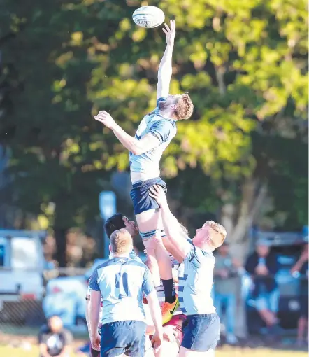  ?? Picture: RICHARD GOSLING ?? Helensvale’s Matiu Fifield jumps highest during his side’s win over Nerang.