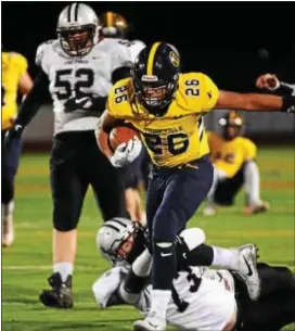  ?? BILL RUDICK — FOR DIGITAL FIRST MEDIA ?? Unionville’s Dante Graham runs out of an ankle tackle from Haven’s Ryan Crouse in Friday night’s home victory. Strath