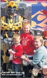  ??  ?? FUN DAY OUT Oliver, left, with Leo and mum Keri