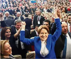  ?? — AFP ?? Upbeat mood: Aksener celebratin­g after launching her new ‘Iyi Parti’ or ‘Good Party’ in Ankara.