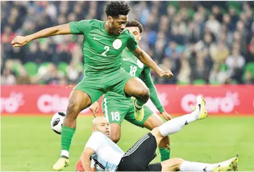  ??  ?? Ola Aina fights for the ball with Javier Mascherano of Argentina during the friendly match in Russia.