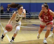  ?? AUSTIN HERTZOG - MEDIANEWS GROUP ?? Pope John Paul II guard Tess Crossan drives as Owen J. Roberts’ Maddi Koury defends Thursday.