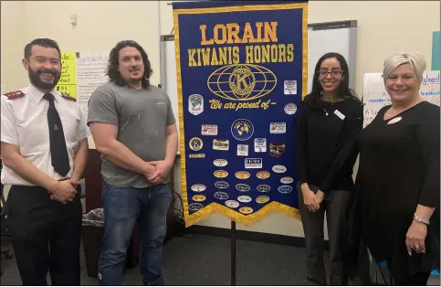  ?? LYRIC AQUINO — THE MORNING JOURNAL ?? Lorain Kiwanis Board of Directors members include: from Left, Captain Jimmy Susa of the Salvation Army Lorain Corps; Brandon Wysocki: President Giovana Kallas and Secretary Nikki LeGalley, who posed March 12at the first Lorain Kiwanis meeting.