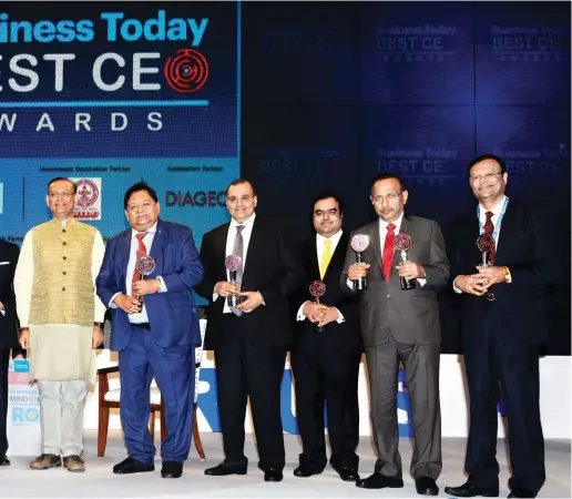  ??  ?? Winners of the BT Best CEO Awards with Union Minister of State for Civil Aviation, Jayant Sinha, and Aroon Purie, Chairman and Editor-in-Chief, India Today Group