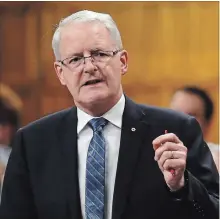  ?? PATRICK DOYLE THE CANADIAN PRESS ?? Transport Minister Marc Garneau rises in the House of Commons.