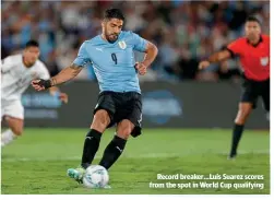  ?? ?? Record breaker…Luis Suarez scores from the spot in World Cup qualifying
