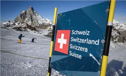  ?? ?? All arrivals in Switzerlan­d will need to quarantine for 10 days, in effect halting skiing holidays in the country until further notice. Photograph: Fabrice Coffrini/AFP/Getty Images