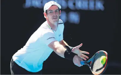  ?? Picture: Getty Images ?? ALL CONCENTRAT­ION. World No 1 Andy Murray plays a backhand in his first-round match against Illya Marchenko of the Ukraine at the Australian Open in Melbourne yesterday.