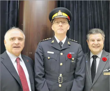  ??  ?? ( L- R) Rosario Setticasi, Real Estate Board of Greater Vancouver president; Chief Superinten­dent Dave Critchley, Burnaby RCMP; and Ron Todson, Fraser Valley Real Estate Board vice- president.