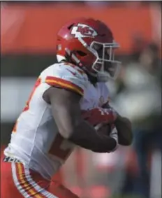  ?? DAVID RICHARD — THE ASSOCIATED PRESS FILE ?? Former Kansas City Chiefs running back Kareem Hunt, here rushing for a touchdown against Cleveland on Nov. 4, has apologized for his behavior as displayed last week on a TMZ video that came to light.