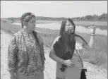  ?? Canadian Press photo ?? Mi’kmaq activists Dorene Bernard, right, and Ducie Howe stand on the shores of the Shubenacad­ie River, a 72-kilometre tidal river that cuts through the middle of Nova Scotia and flows into the Bay of Fundy, in Fort Ellis, N.S. last week.