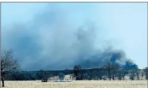  ?? The McAlester News-Capital via AP ?? Smoke billows from the site of a gas well fire in January 2018 near Quinton, Okla., after an explosion and fire killed five workers at the well as a result of the failure of blowout prevention devices and other factors.