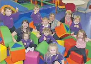  ??  ?? Childcare practition­ers Claire Greenlees, Lori Silvan and Elizabeth MacDonald with the following nursery children: Tristan, 4, Aria, 4, Neil, 4, John, 4, Rhiannon, 4, Sienna, 4, Aimee, 4 and Jemma, 4.