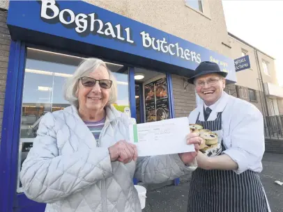  ?? ?? Caption in here
Well done to Elsie Brodie from Bathgate, who is the most recent winner of our
Butcher Boy competitio­n. Elsie is pictured with Paul Boyle of Boghall Butchers.
Four your chance to win, just look out for the Butcher Boy in today’s paper.