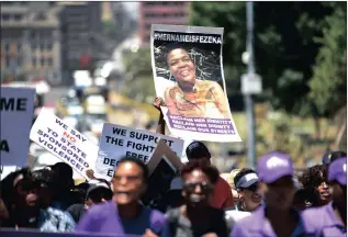  ?? Picture: NOKUTHULA MBATHA ?? STANDING TOGETHER: A group march from Gauteng High Court to Constituti­on Hill to protest against the denial of justice for ‘Khwezi’, who accused President Jacob Zuma of raping her.