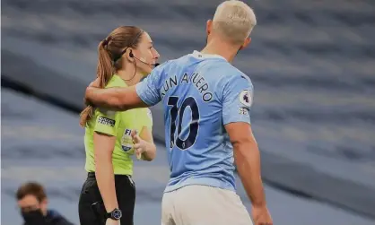  ?? Photograph: Michael Regan/Getty Images ?? Sergio Agüero was unhappy at Sian Massey-Ellis for awarding a throw-in to Arsenal and placed his hand on her left shoulder.