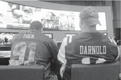  ?? WAYNE PARRY/AP ?? This 2018 photo shows fans watching a football game after placing bets in the lounge at the Ocean Casino Resort in Atlantic City, N.J.