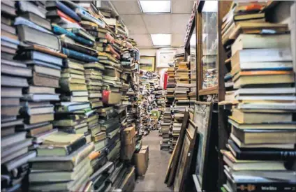  ??  ?? For the love of books: Collector’s Treasury in Johannesbu­rg (above) and Ike’s Book’s in Durban (below). Photos: Anthony Schultz and Rogan Ward