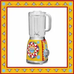  ??  ?? The limited edition blender is characteri­zed by a bright yellow base with traditiona­l Sicilian decoration­s.