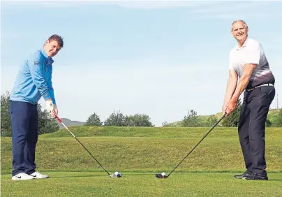  ??  ?? Robert MacIntyre, left, and survivorJa­mes Scott prepare to tee off at Glencruitt­en Golf Club in Oban