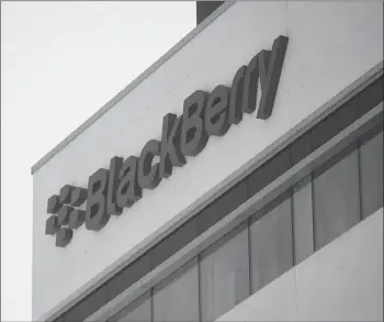  ?? CP PHOTO ?? The Blackberry logo located in the front of the company’s B building in Waterloo, Ont.