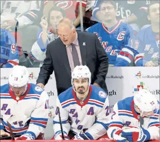  ?? Corey Sipkin ?? TAKE A SEAT: Head coach Gerard Gallant surveys his Rangers bench during their 3-1 loss in Game 5 to Carolina on Thursday night. Gallant said his players looked “tired” in the game, though he didn’t address that with them afterward.