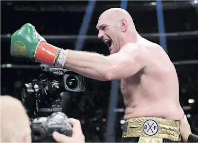  ?? Picture: AFP ?? RUNNING SHOES ON. Briton Tyson Fury (above) does not think Deontay Wilder will want a rematch any time soon.
