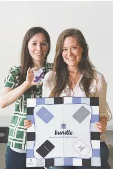  ?? Philadelph­ia Inquirer Jose F. Moreno, ?? Cassie Collier and Jacklyn Collier created a customized board game “Bundle.” The sisters grew up on board games in Pennsylvan­ia and wanted to pass on their love with a game intended to bring people together over nostalgia.