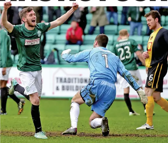  ??  ?? Quite an entrance: Stanton raises his arms in delight after netting Hibs’ third goal against Berwick — just two minutes after coming on
