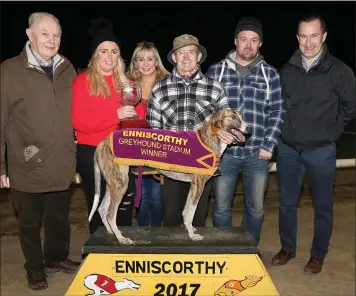  ??  ?? The Grand Prize A1/A2 525 final presentati­on, won by East Coast Blaze, at Enniscorth­y greyhound track on Thursday (from left): Christy Murphy (Enniscorth­y track), Sharon Redmond and Hazel Smyth (sponsors), John Kehoe (owner), Noel Kehoe, Barry Goff...