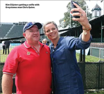  ??  ?? Kim Clijsters getting a selfie with Greystones man Chris Quinn.