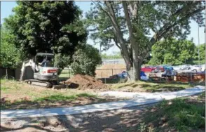  ?? CHARLES PRITCHARD - ONEIDA DAILY DISPATCH ?? Madison County employees do some excavation in preparatio­n for the Wampsville Community Park on Wednesday, July 11, 2018.